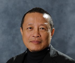 A man in a black rollneck jumper